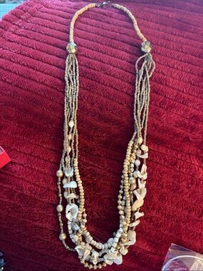 Multi-Strand Cream Beaded Necklace with Shell Accents